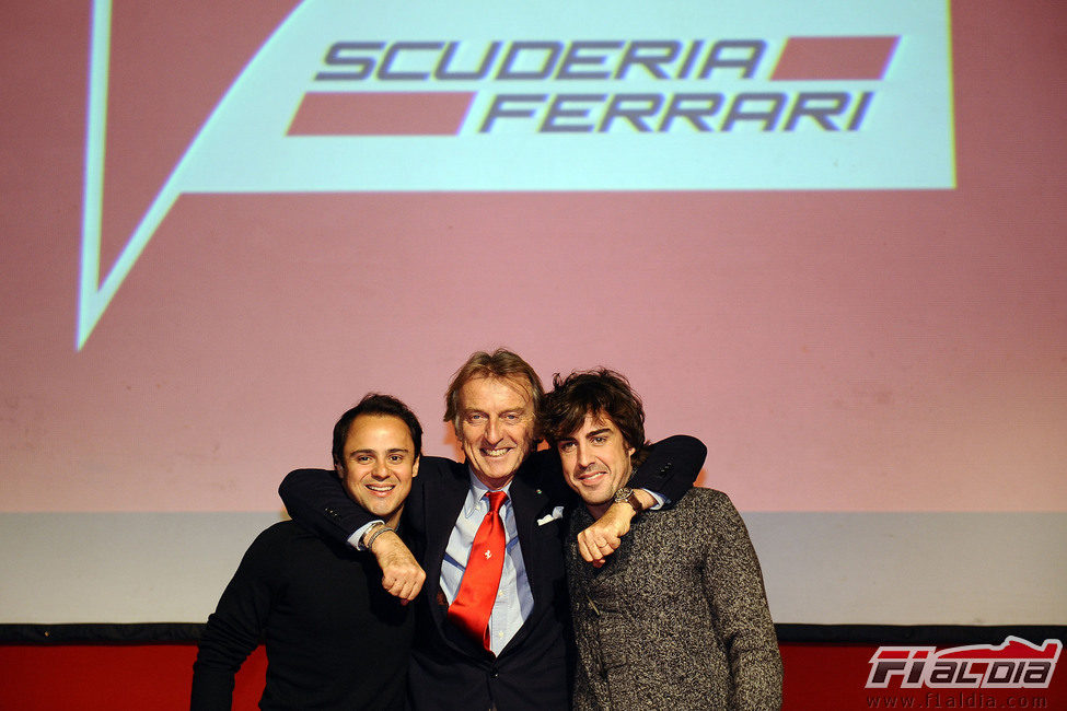 Luca di Montezemolo abraza a Fernando Alonso y Felipe Massa